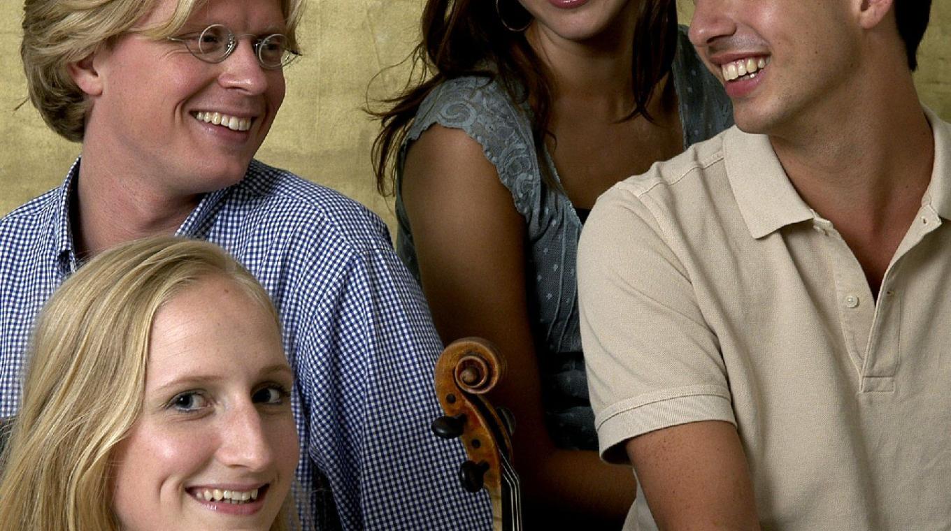 Musicians smiling at each other