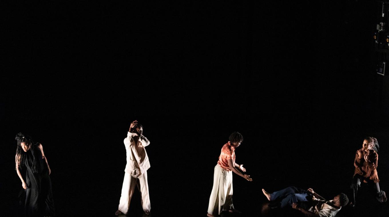 five dancers in different poses