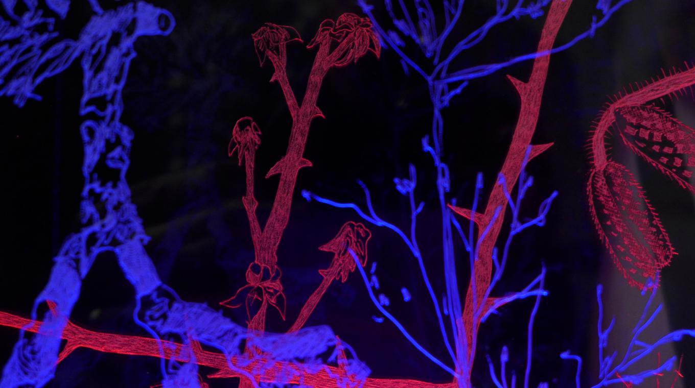 Blue and red neon embroidery of plants